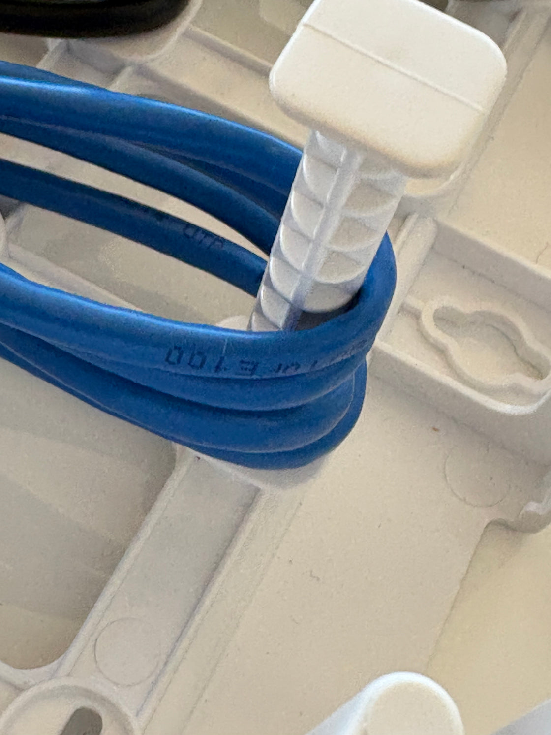 Close-up of Wire Wonder peg, which helps to eliminate kinking and overbending 