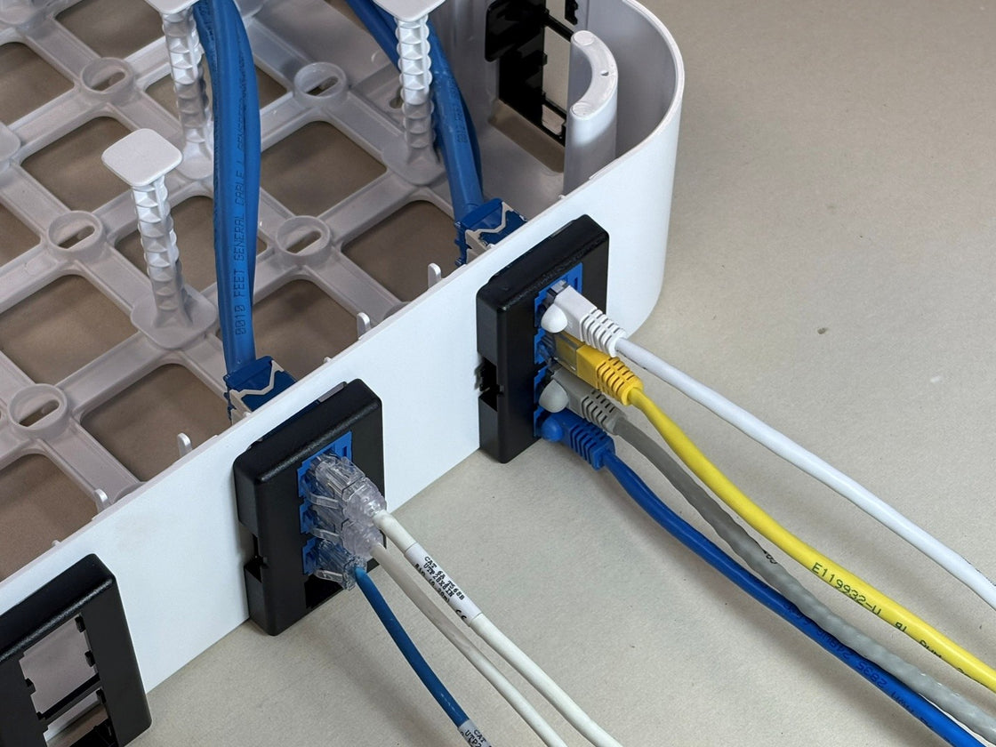 Wire Wonder used as an HCP or MUTOA with furniture faceplates, modular jacks and patch cords